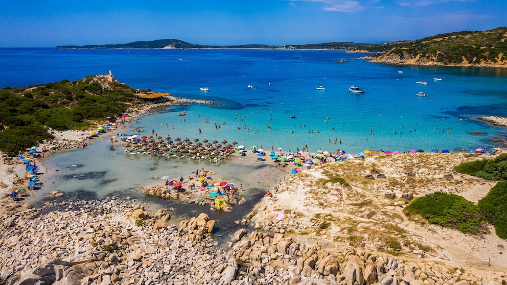 On a beach in Sardinia, certain groups of people are banned from using umbrellas.