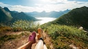 Active Vacationers in Norway Enjoying Fjord Views