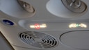 During flight turbulence, the seatbelt signs are turned back on.