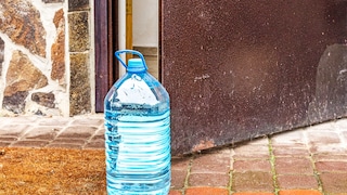 Bottles Placed in Front of Doors in Italy–What It Means