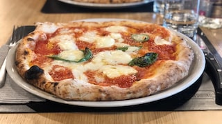 The best pizza in the world, according to the current "Top 50 Pizza" ranking, is prepared in the Neapolitan style.