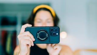 Woman Photographs Her Apartment Before a Trip
