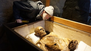Anatomy professor Andreas Winkelmann during the initial examination of the mummy of Knight Kalebuz in his crypt