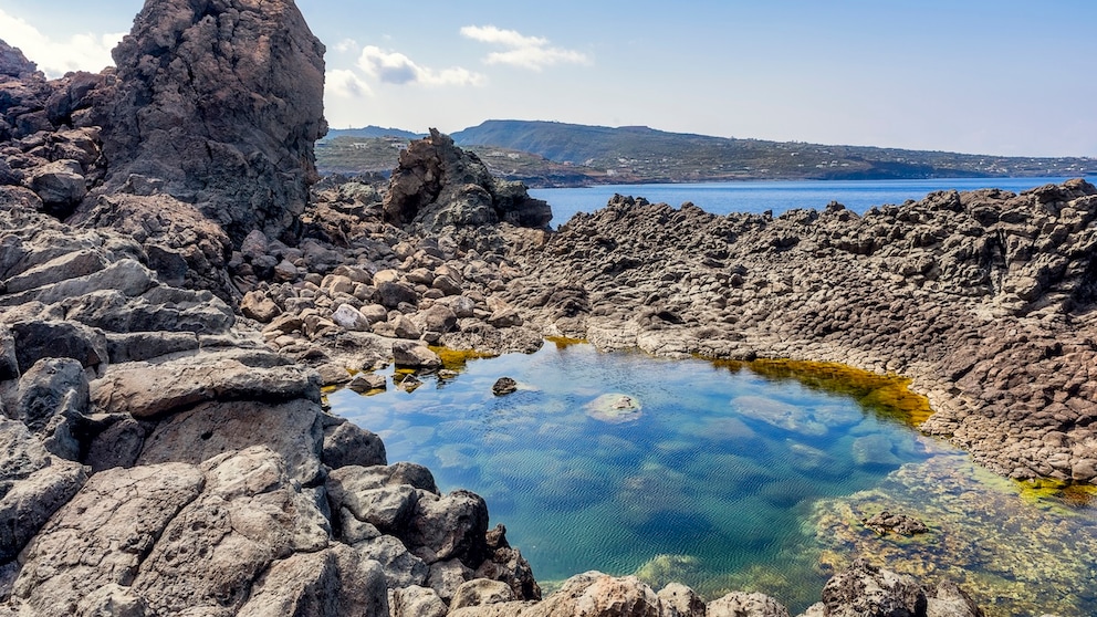 On Pantelleria, numerous natural pools are nestled amid volcanic rock.
